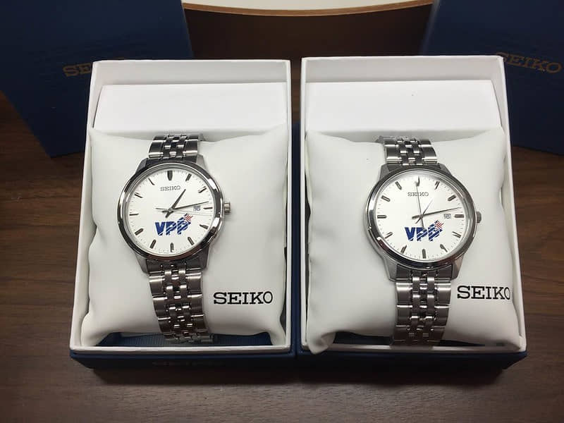 2 personalized promotional wrist watches in their cases