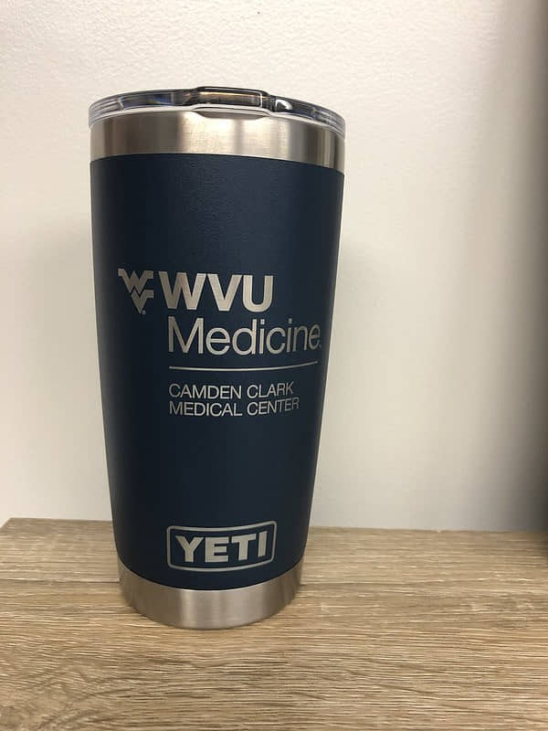 A yeti insulated mug with promotional logo