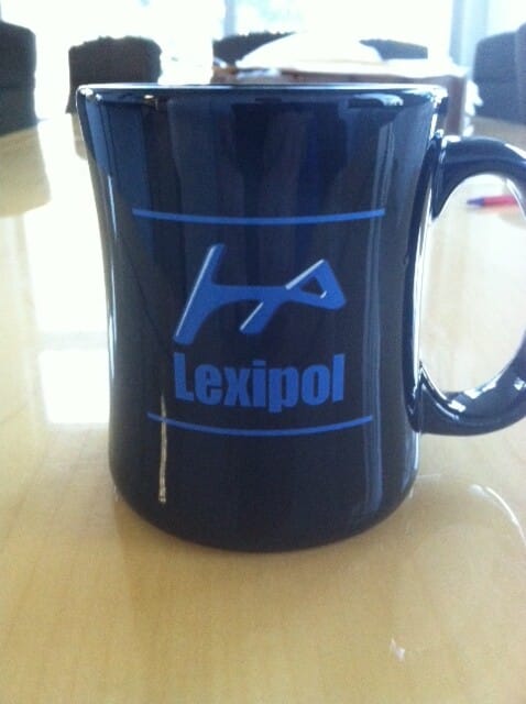 A customized Coffee mug with logo and business name