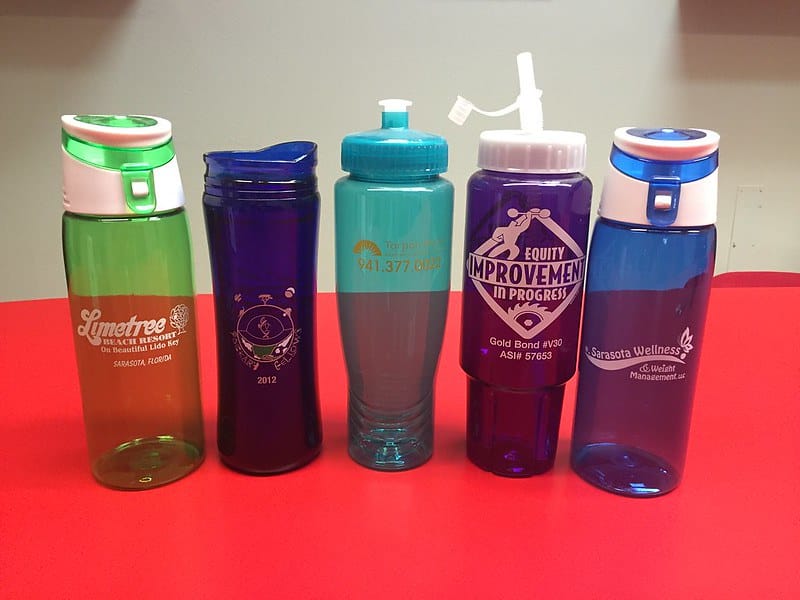 Various water bottles for various companies