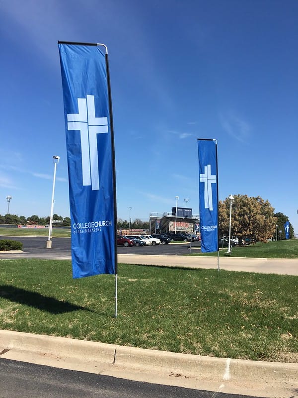 A pair of freestanding flags for a church