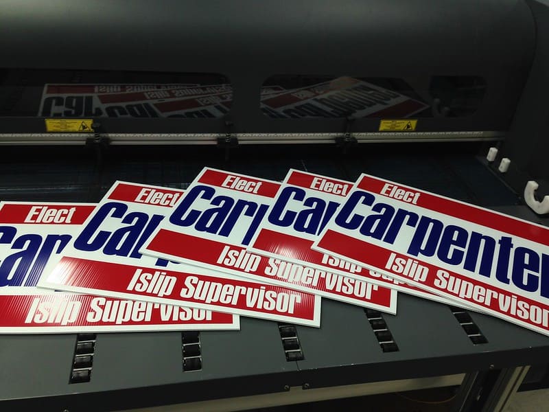 Political yard signs for a governor 